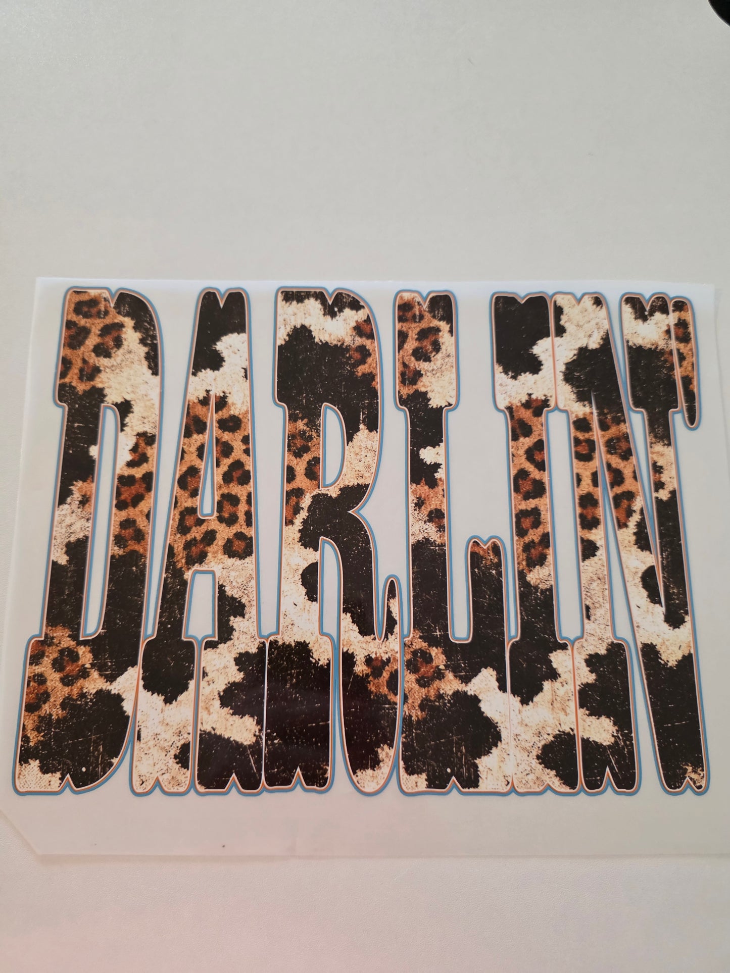 Darlin' - Cow Print