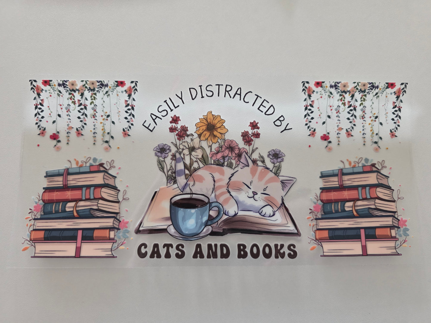 B55 - Easily distracted by cats and books
